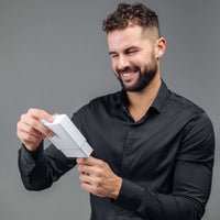Thumbnail for Man Grey Photo Bracelet being unwrapped by a smiling man in a black shirt, perfect gift by Brother & Sisters.