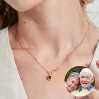 Thumbnail for Stars Photo Necklace by Brother & Sisters featuring a hidden photo projection of cherished moments.