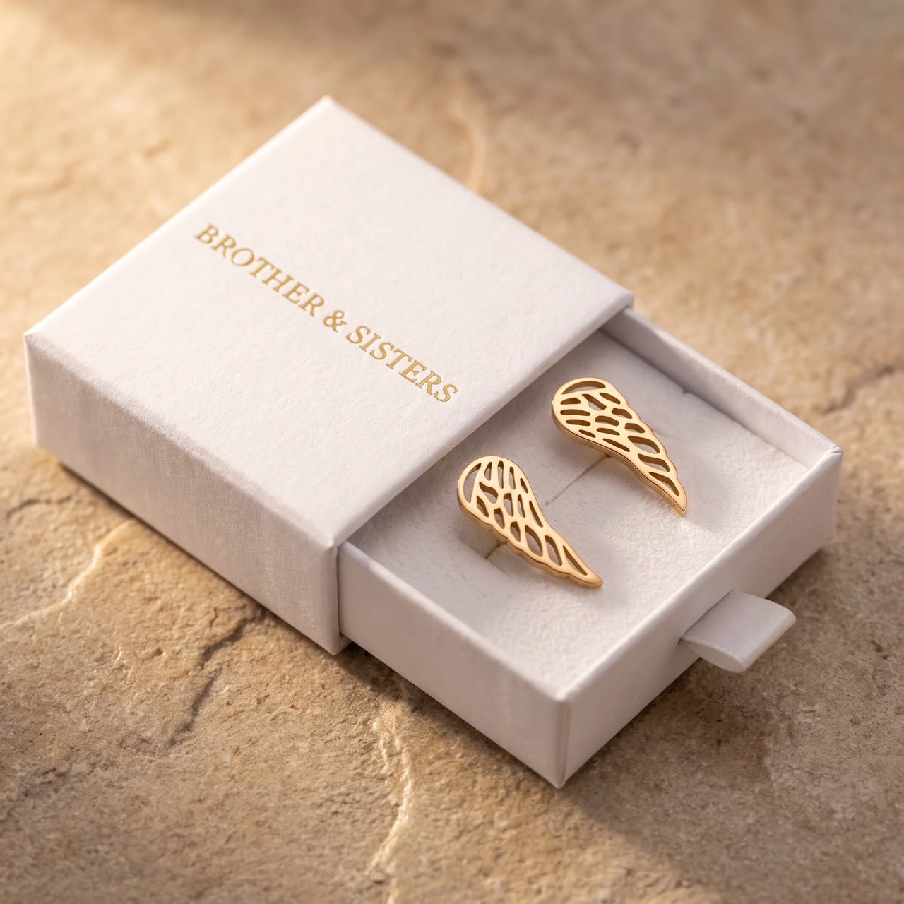 The gold stud earrings in the Brother & Sisters gift box | SKU: 42008-gold