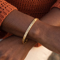 Thumbnail for Close-up of the Never Forget To Dream bracelet in gold worn | SKU: nftd-g