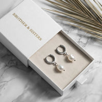 Thumbnail for Pearl Drop Huggie Hoops in Silver, in the gift box | SKU: 41003-silver