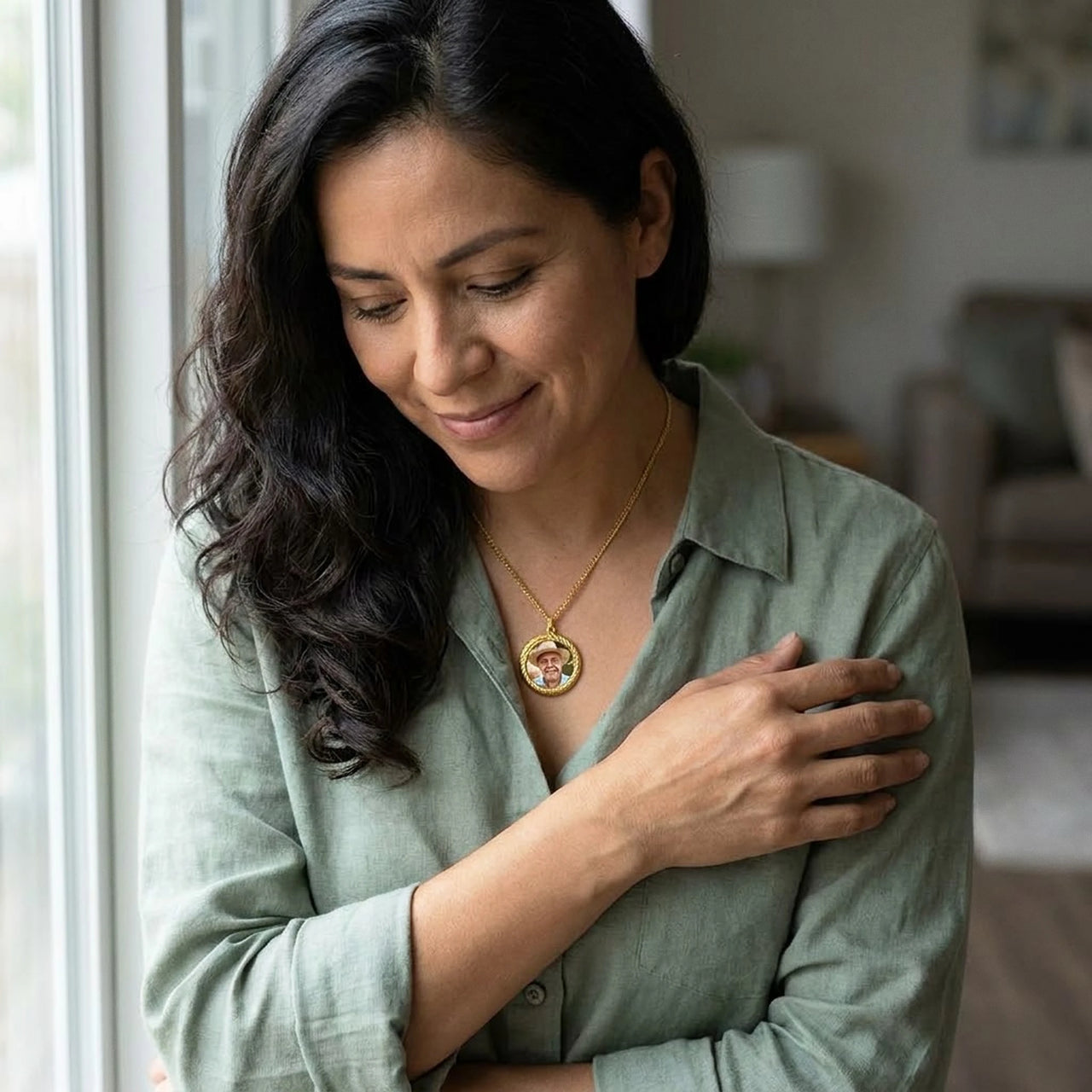 Woman wearing the gold round photo necklace with her father's photo | SKU: TPH-RNDN-GOLD