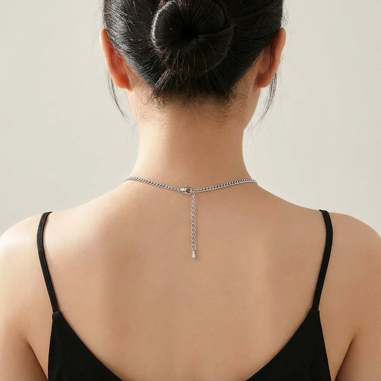 Back of the neck showing the lobster clasp and extension chain of the silver photo necklace | SKU: TPH-RNDN-SILVER