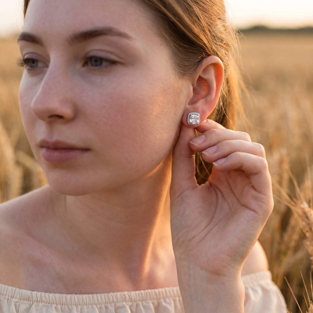 Cushion cut stud earrings — worn, everyday gesture, silver | SKU: 505185-white